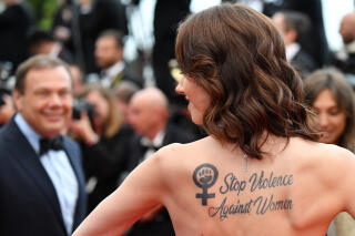 Belgian-Dutch actress Sand Van Roy sporting a tattoo reading 